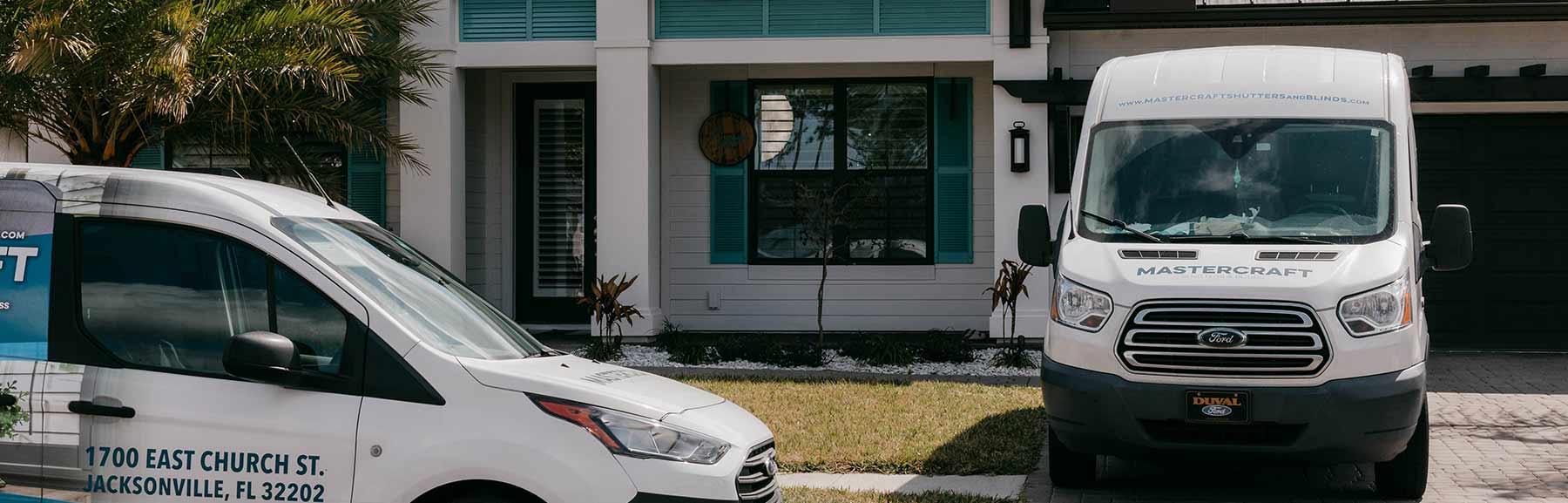 MasterCraft vans outside of a client's home.